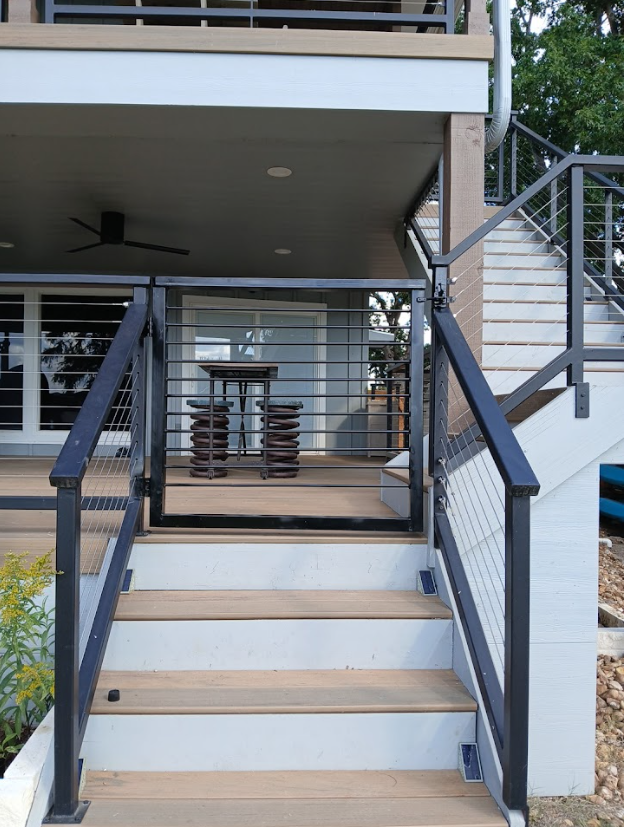 Modern cable railing on deck stairs